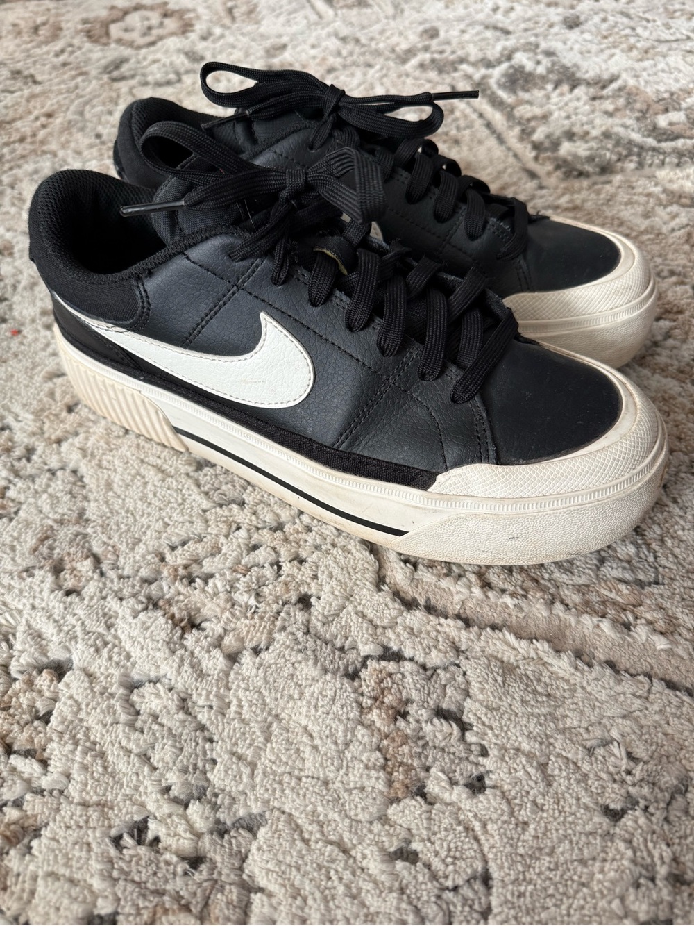 Nike Black Leather Platform Sneakers with White Swoosh and Cream Sole
